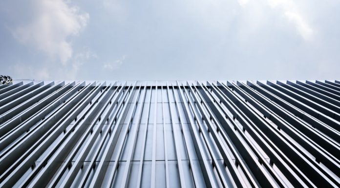 Нержавеющий профнастил: плюсы, особенности, область применения